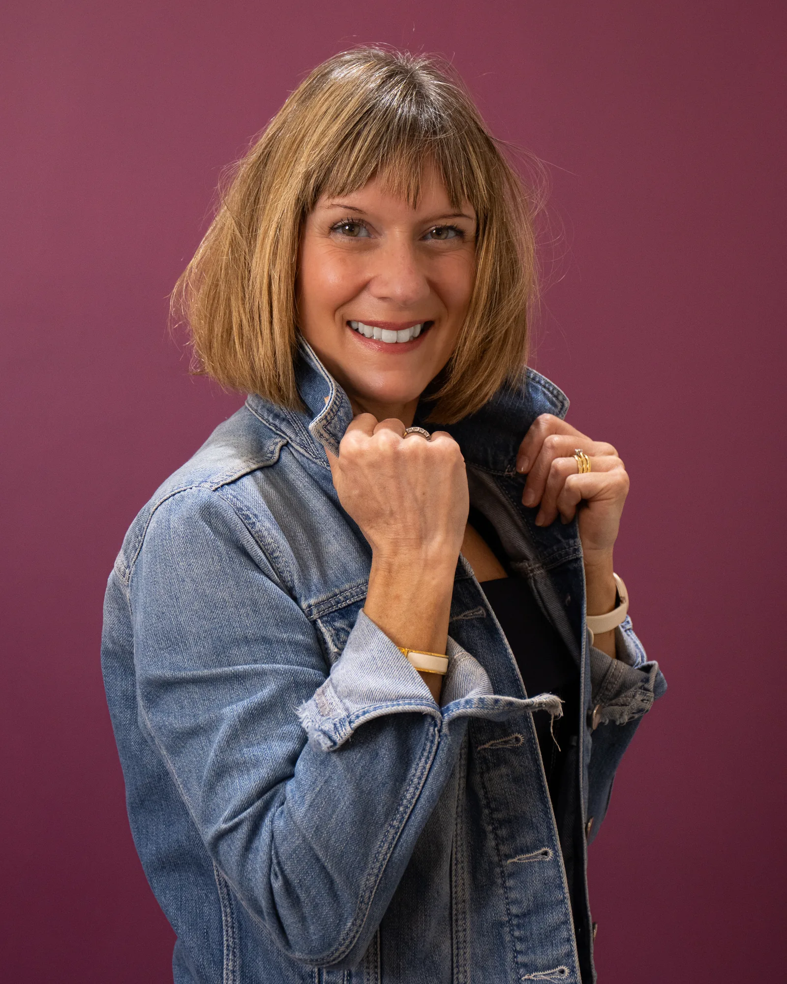 Pam Stockdale, founder of Zeal Mortgage & Protection Solutions, in a denim jacket